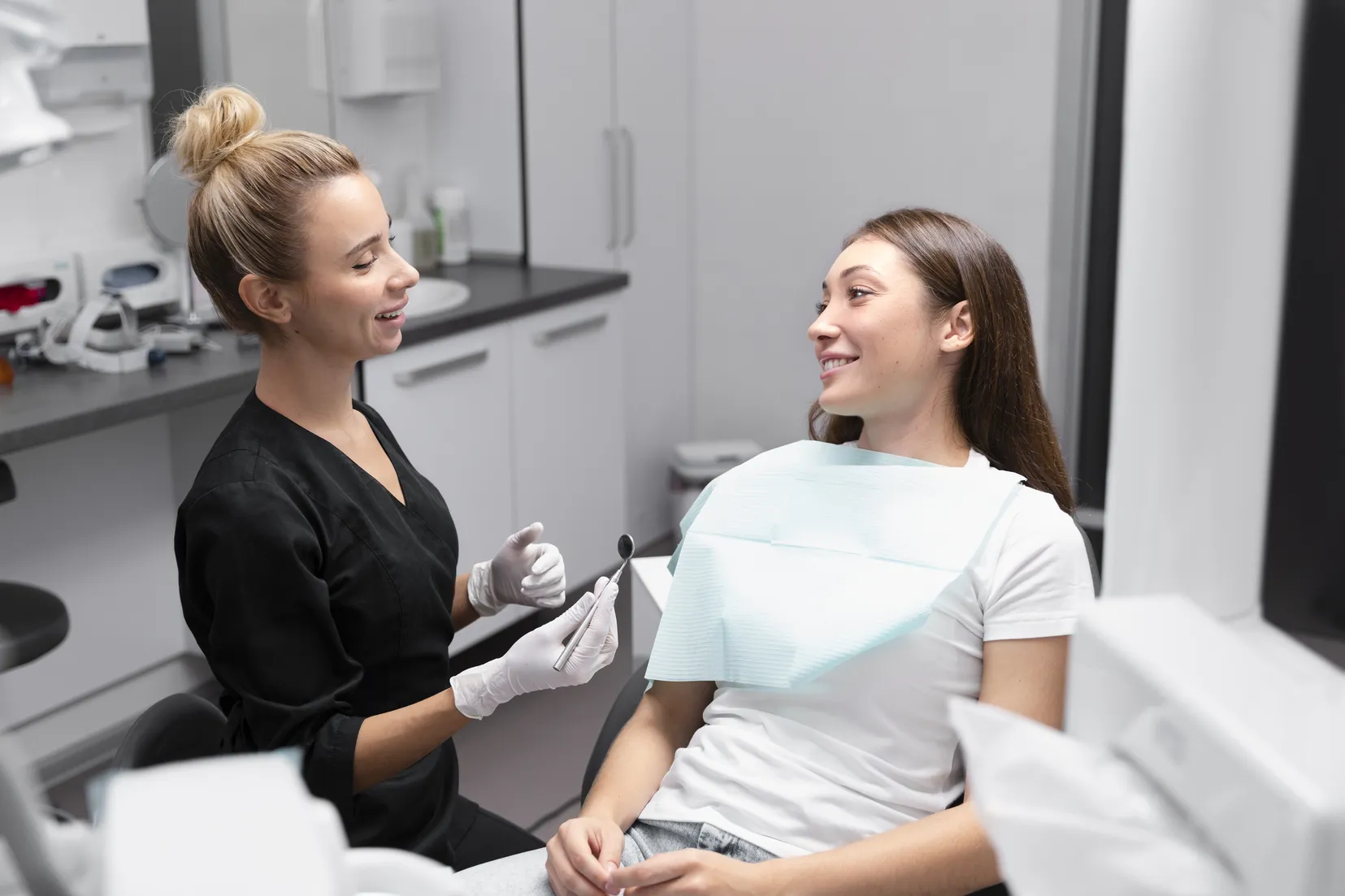medium-shot-patient-dentist-clinic (1).jpg